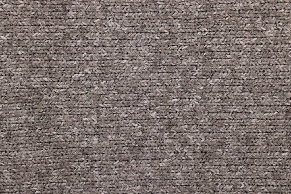Close-up of a grey twist-pile carpet